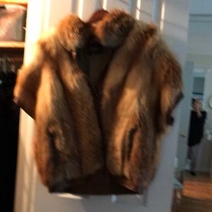 Fox vest with leather trim